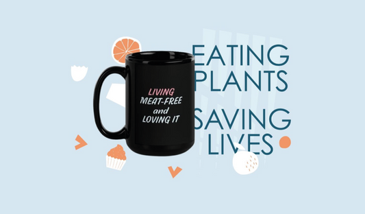 Black mug set against a light, simple backdrop, representing a strong and stylish choice for plant-based advocates