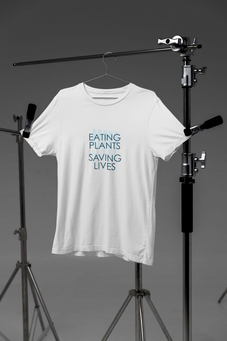 Cotton tee with 'Eating Plants, Saving Lives' slogan and animal prints