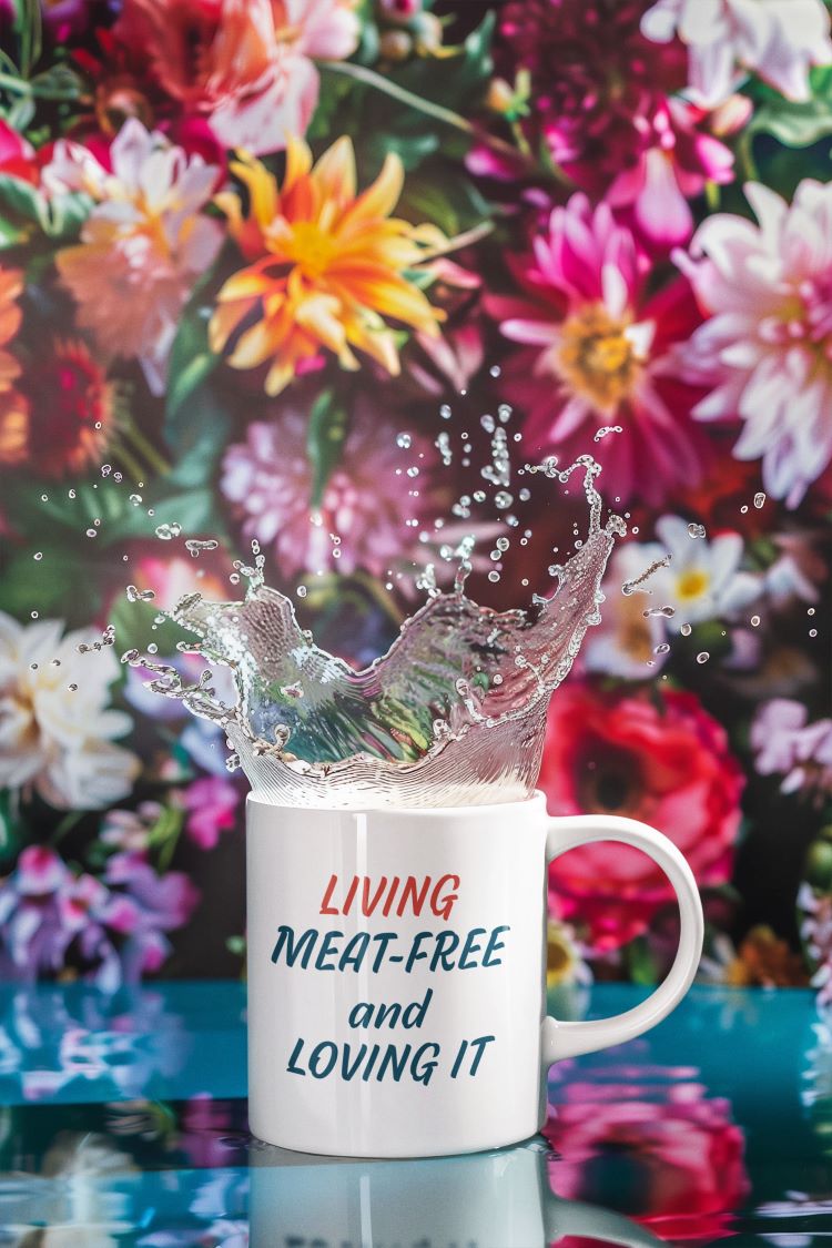 Glossy mug with 'Living Meat-Free and Loving It' slogan