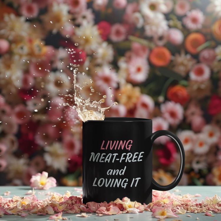 Glossy mug with 'Living Meat-Free and Loving It' slogan print