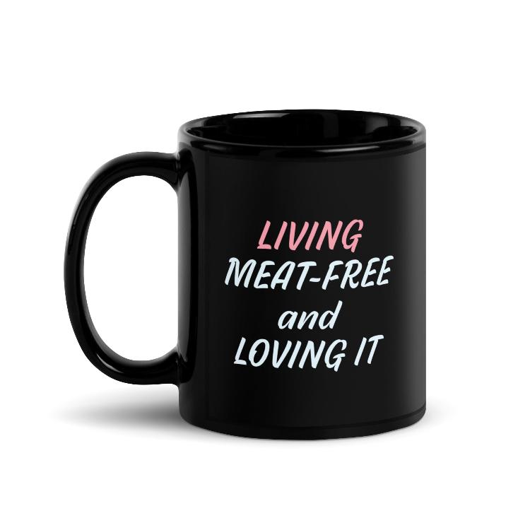 Glossy mug with 'Living Meat-Free and Loving It' slogan print