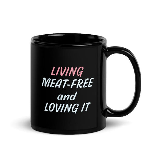 Glossy mug with 'Living Meat-Free and Loving It' slogan print