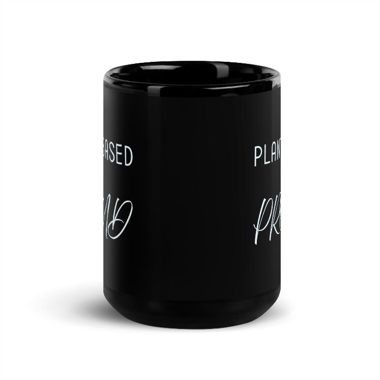 Glossy mug with 'Plant-Based and Proud' slogan promoting a meat-free lifestyle