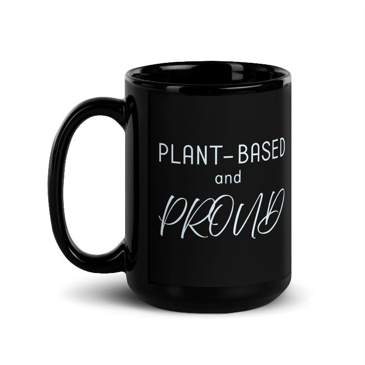 Glossy mug with 'Plant-Based and Proud' slogan promoting a meat-free lifestyle