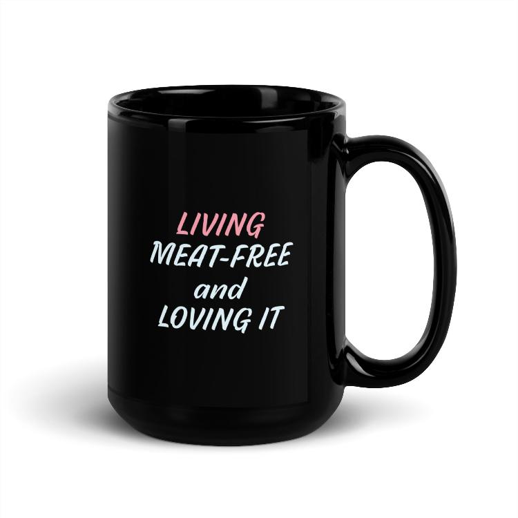 Glossy mug with 'Living Meat-Free and Loving It' slogan print