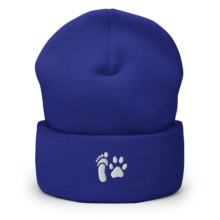 Cuffed beanie with human foot and animal paw embroidery symbolizing unity