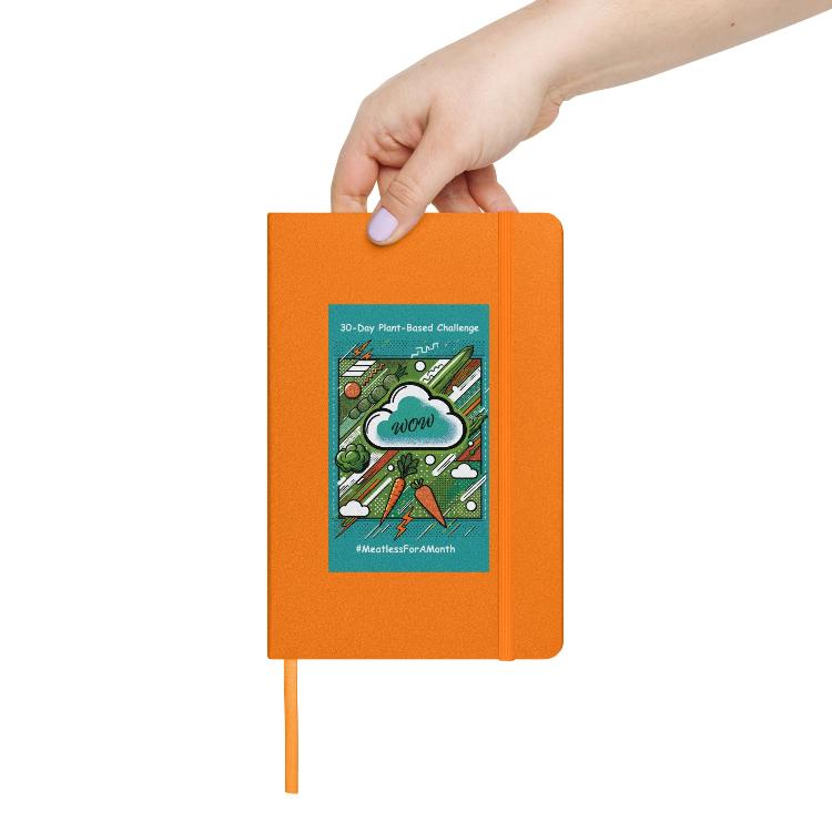 Eco-friendly notebook, vibrant pop art design, bright green, turquoise, orange vegetables, 30-Day Plant-Based Challenge, sustainable living, animal rights, cream-colored lined pages, elastic closure, ribbon marker