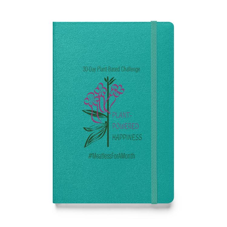 Vegetizer Hardcover Notebook with 'Plant-Powered Happiness' message, 80 lined cream-colored pages, elastic closure, ribbon marker, expandable inner pocket, eco-friendly design, promoting plant-based lifestyle