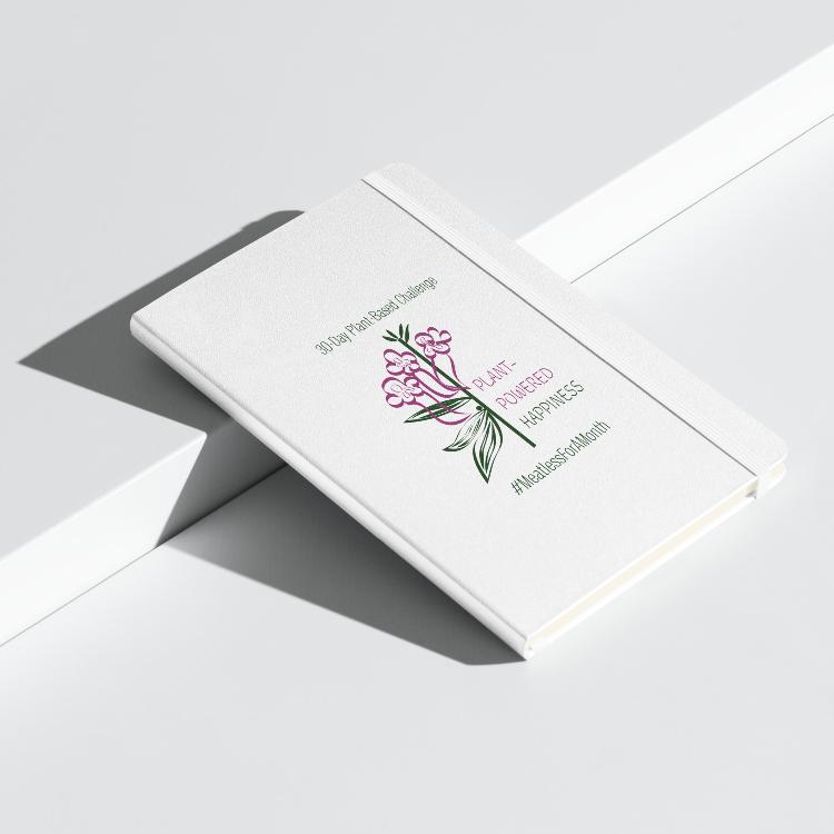 Vegetizer Hardcover Notebook with 'Plant-Powered Happiness' message, 80 lined cream-colored pages, elastic closure, ribbon marker, expandable inner pocket, eco-friendly design, promoting plant-based lifestyle