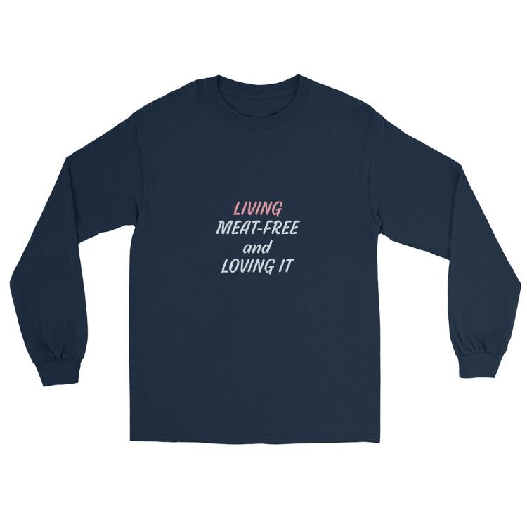 Long sleeve shirt with “Living Meat-Free and Loving It” slogan and animal prints