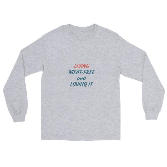 Long sleeve shirt featuring the slogan “Living Meat-Free and Loving It” with animal prints