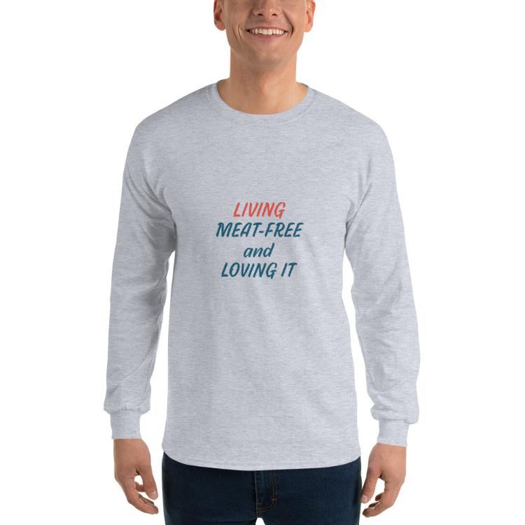 Long sleeve shirt featuring the slogan “Living Meat-Free and Loving It” with animal prints