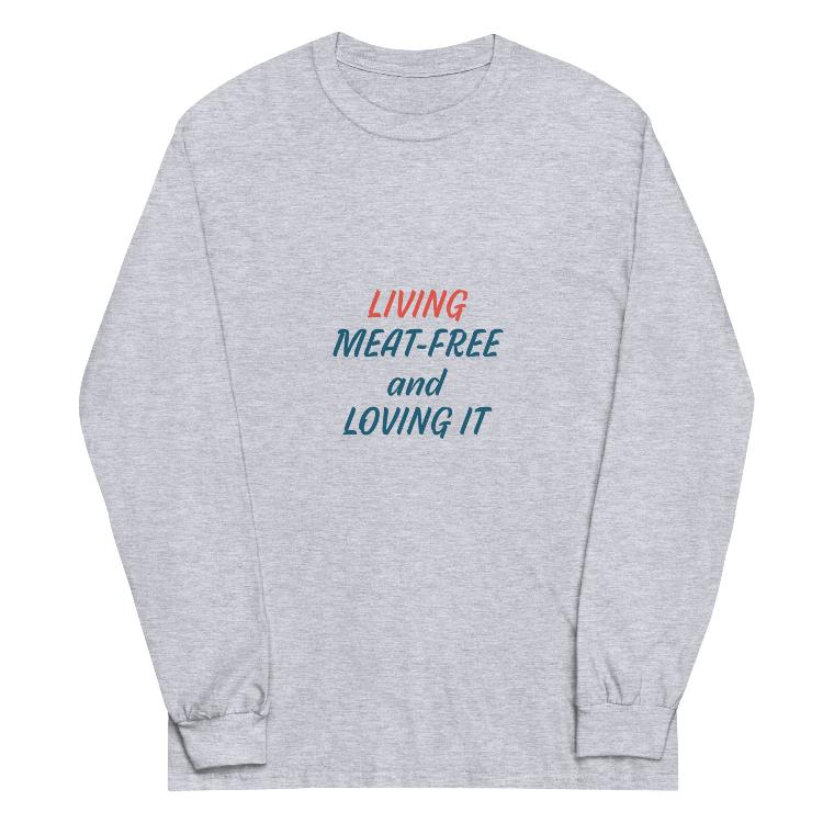 Long sleeve shirt featuring the slogan “Living Meat-Free and Loving It” with animal prints