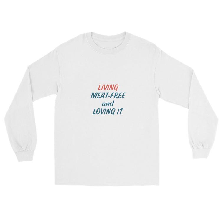 Long sleeve shirt featuring the slogan “Living Meat-Free and Loving It” with animal prints