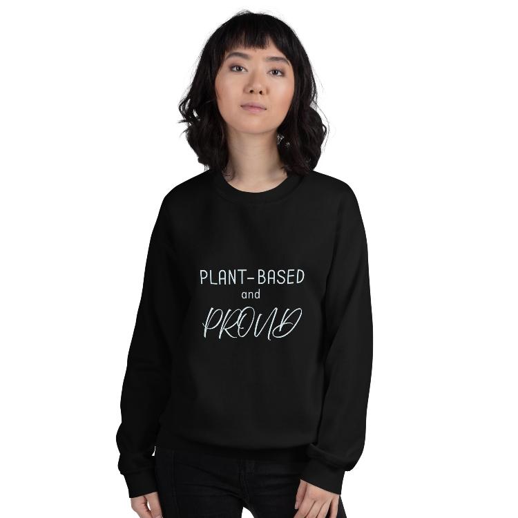 Comfortable sweatshirt with "Plant-Based and Proud" front print, human foot and animal paw design on the outside label, promotes a plant-based lifestyle, 50% cotton and 50% polyester blend, warm, pre-shrunk, classic fit, ethical fashion, supports animal welfare