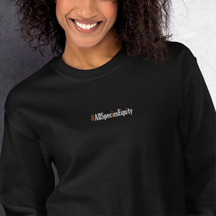 Vegetizer unisex sweatshirt with #AllSpeciesEquity embroidery on the chest and human foot and animal paw design on the right wrist, made from 50% cotton and 50% polyester, pre-shrunk, classic fit, warm and cozy, promoting animal rights and unity