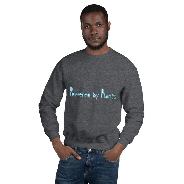 Plant-powered sweatshirt with slogan 'Powered by Plants', featuring human footprint and animal paw print labels, showcasing harmony between humans and animal