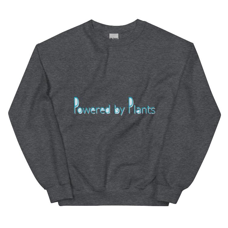 Plant-powered sweatshirt with slogan 'Powered by Plants', featuring human footprint and animal paw print labels, showcasing harmony between humans and animal