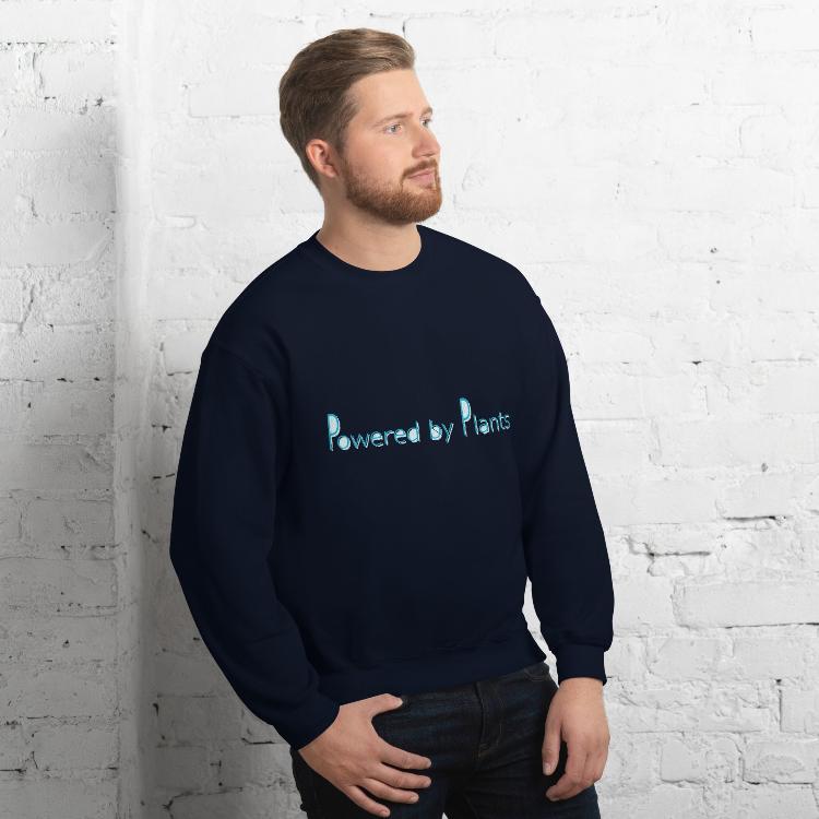 Plant-powered sweatshirt with slogan 'Powered by Plants', featuring human footprint and animal paw print labels, showcasing harmony between humans and animal