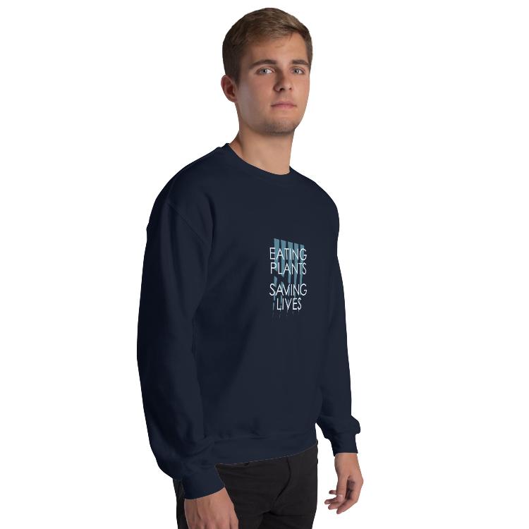 Cozy plant-based sweatshirt with the slogan 'Eating Plants, Saving Lives' on the front, featuring a label with human foot and animal paw prints, promoting animal welfare and a meat-free lifestyle