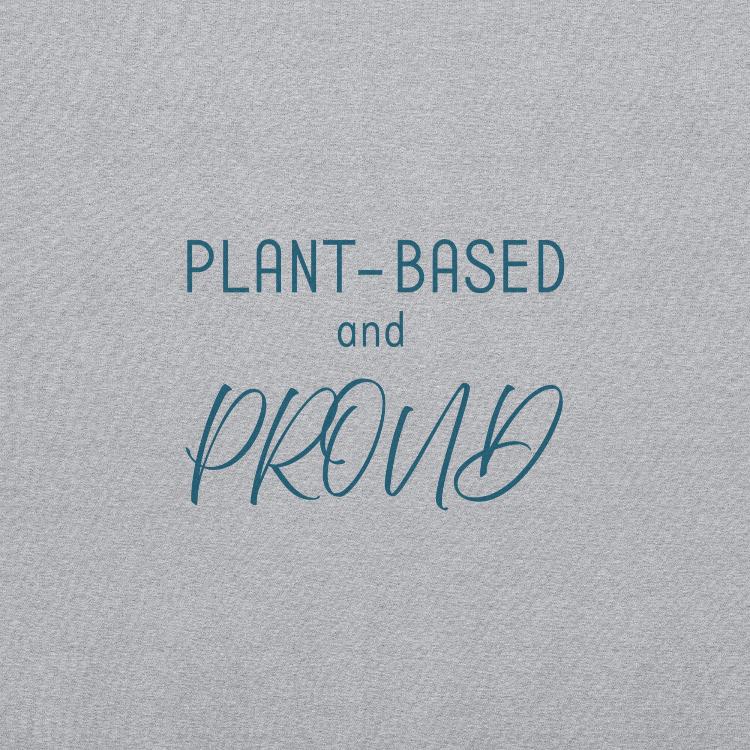 Cozy sweatshirt featuring the slogan "Plant-Based and Proud" on the front, with a human foot and animal paw print on the outside label, symbolizing harmony between humans and animals. Made from a blend of 50% cotton and 50% polyester, this pre-shrunk classic fit sweatshirt is ideal for colder months, promoting a plant-based lifestyle and raising awareness for animal welfare