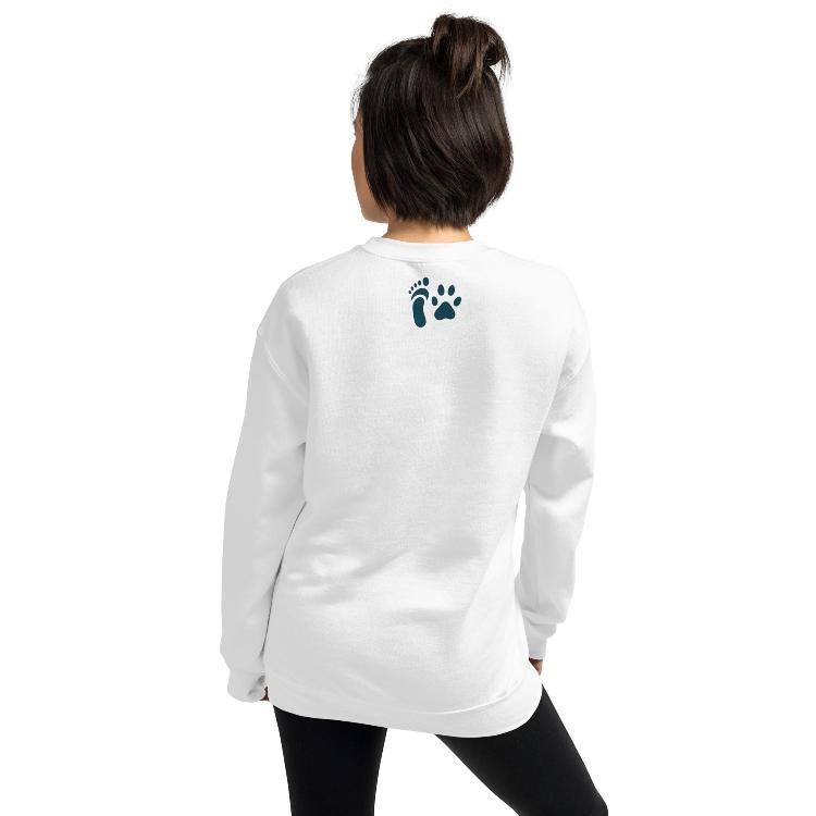 Comfortable sweatshirt with the slogan 'Powered by Plants' on the front, featuring a label with human footprint and animal paw prints, symbolizing harmony between humans and animals, promoting a plant-based lifestyle and animal welfare