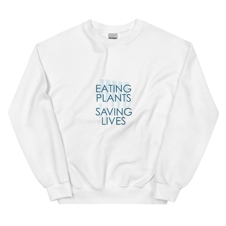 Cozy plant-based sweatshirt featuring the slogan 'Eating Plants, Saving Lives' on the front, with human foot and animal paw prints on the label, promoting the 30-Day Plant-Based Challenge and raising awareness for animal welfare