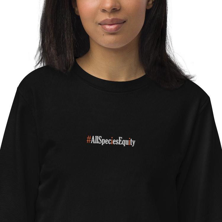 Vegetizer Unisex Organic Sweatshirt supporting the 'All Species Equity' campaign. Features chest embroidery of the hashtag #AllSpeciesEquity and right wrist design of a human foot and animal paw, symbolizing unity. Made from organic and recycled materials for comfort and style