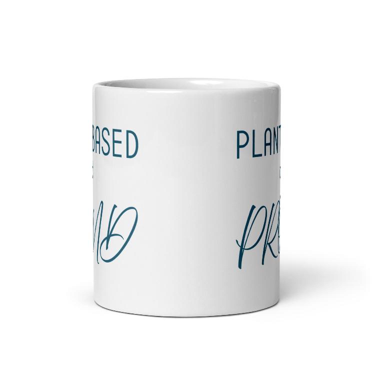 Glossy mug with 'Plant-Based and Proud' slogan promoting a meat-free lifestyle