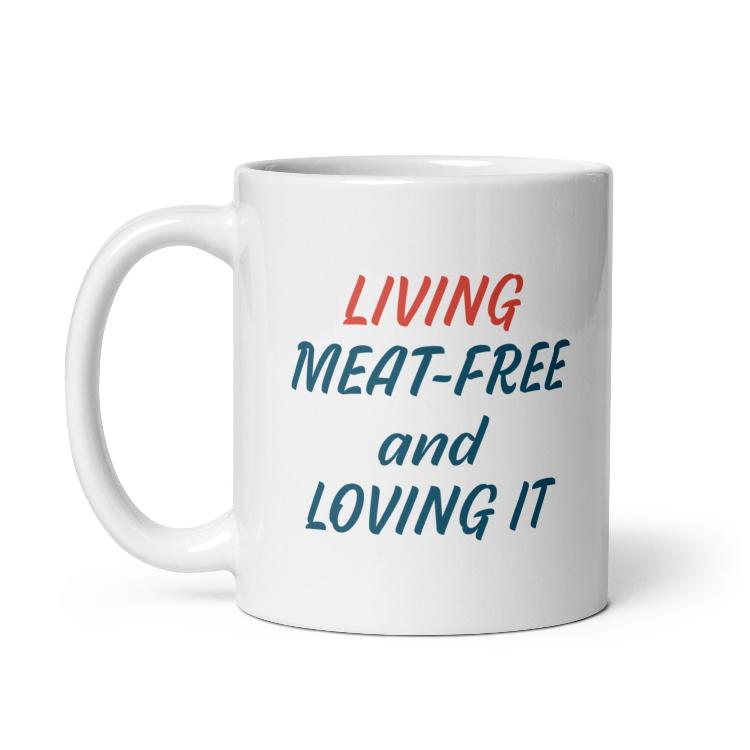 Glossy mug with 'Living Meat-Free and Loving It' slogan