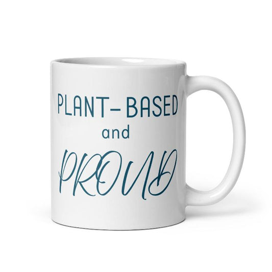 Glossy mug with 'Plant-Based and Proud' slogan promoting a meat-free lifestyle